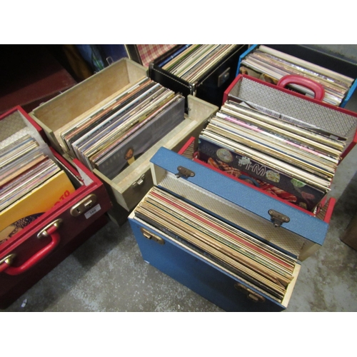 169 - Six cases containing a collection of vinyl LP records, mainly 1970's and 80's, various artists