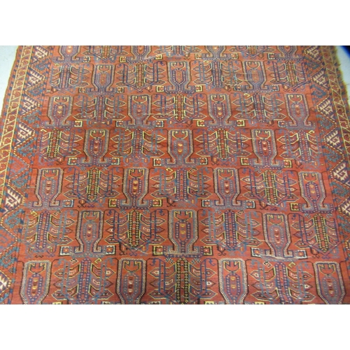 18 - Turkoman carpet of all-over hooked medallion design with multiple borders, 430 x 196cm (with multipl... 