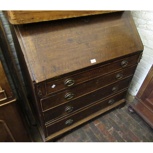 1973 - George III oak bureau, the fall front inclosing a fitted interior, above four graduated drawers on b... 