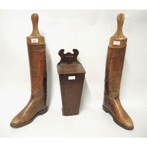 287 - Pair of early 20th Century mid tan leather riding boots with trees, together with an antique oak can... 