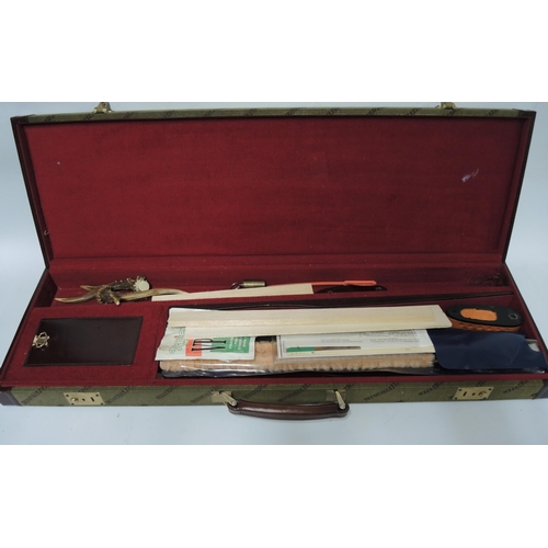 300 - Modern cased gun cleaning kit and a Winchester canvas and leather trimmed gun case