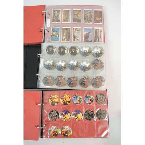 364 - Five albums of trading cards including Merlin Pogs, Goldeneye, Cromwell etc.