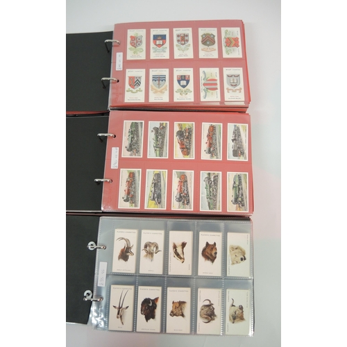 367 - Five albums of Players cigarette cards, together with two albums of Wills cigarette cards