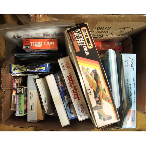 413 - Four boxes containing a quantity of unmade model aircraft kits, including Airfix, Revel, Tamiya, Ita... 