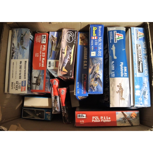 413 - Four boxes containing a quantity of unmade model aircraft kits, including Airfix, Revel, Tamiya, Ita... 