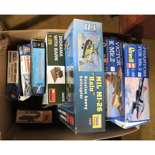 413 - Four boxes containing a quantity of unmade model aircraft kits, including Airfix, Revel, Tamiya, Ita... 