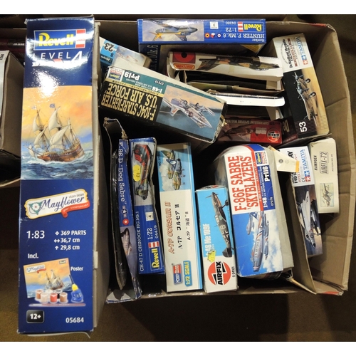 414 - Four boxes containing a quantity of unmade model aircraft kits, including Airfix, Revel, Tamiya, Ita... 