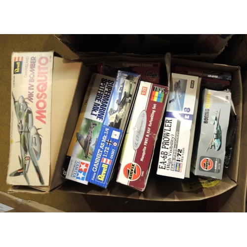 414 - Four boxes containing a quantity of unmade model aircraft kits, including Airfix, Revel, Tamiya, Ita... 