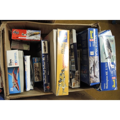 415 - Four boxes containing a quantity of unmade model aircraft kits, including Airfix, Revel, Tamiya, Ita... 