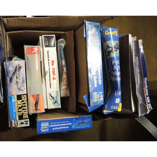 415 - Four boxes containing a quantity of unmade model aircraft kits, including Airfix, Revel, Tamiya, Ita... 