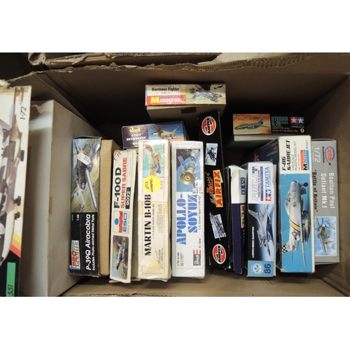 416 - Four boxes containing a quantity of unmade model aircraft kits, including Airfix, Revel, Tamiya, Ita... 