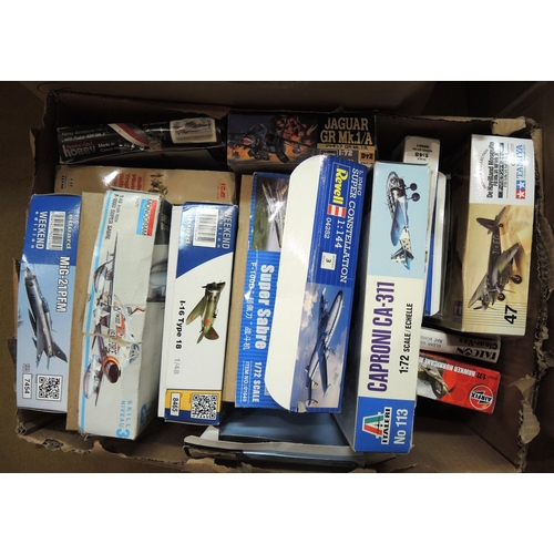 416 - Four boxes containing a quantity of unmade model aircraft kits, including Airfix, Revel, Tamiya, Ita... 