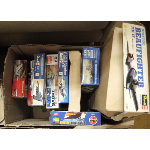 416 - Four boxes containing a quantity of unmade model aircraft kits, including Airfix, Revel, Tamiya, Ita... 