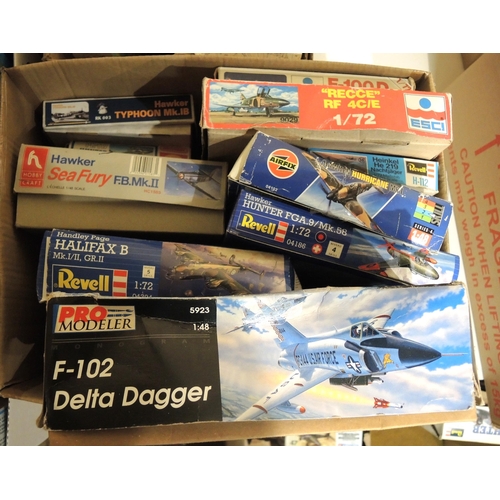 417 - Four boxes containing a quantity of unmade model aircraft kits, including Airfix, Revel, Tamiya, Ita... 