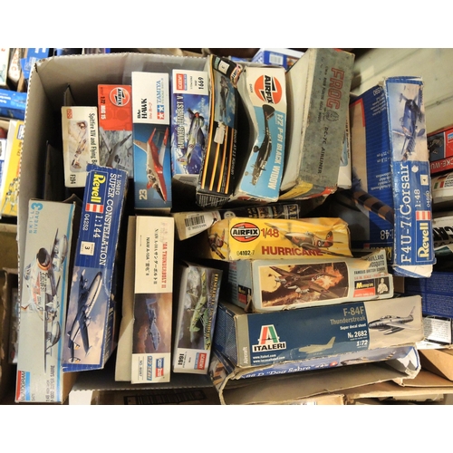 417 - Four boxes containing a quantity of unmade model aircraft kits, including Airfix, Revel, Tamiya, Ita... 