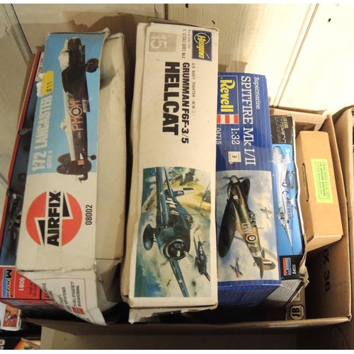 417 - Four boxes containing a quantity of unmade model aircraft kits, including Airfix, Revel, Tamiya, Ita... 