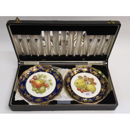 523 - Hammersley & Company, set of six porcelain fruit plates with silver plated knives and forks, in a fi... 