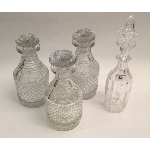 524 - Set of three 19th Century heavy cut glass decanters with stoppers (chips to rims), and another cut g... 