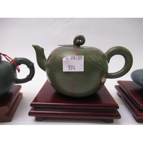 594 - Group of five Chinese Yixing terracotta teapots