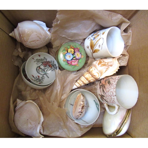 650 - Small quantity of porcelain miniatures, shell form purse, together with four seashells with carved c... 