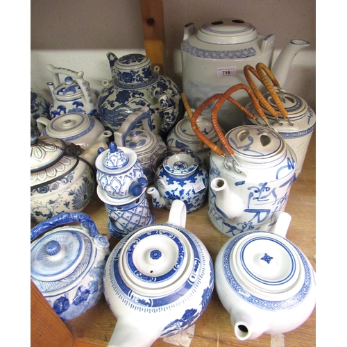 716 - Two 20th Century Chinese blue and white calligraphic teapots, together with a large collection of ot... 