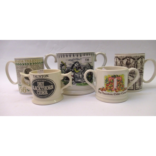 726 - Taunton Cider Company two handled loving cup 1976, together with four other similar cups and mugs