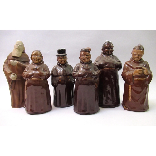 737 - Pair of Quimper pottery wall pockets, together with a group of six pottery figural decanters