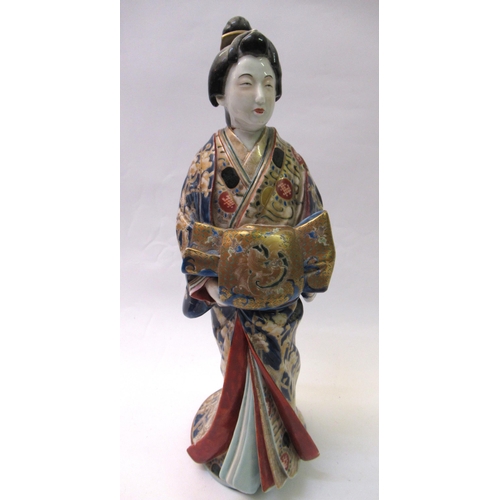 742A - Late 19th / early 20th Century Japanese porcelain figure of a geisha, 37cm tall, (at fault)