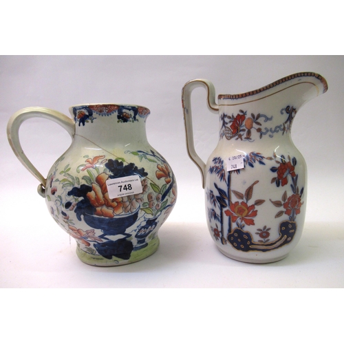 748 - Two 19th Century ironstone jugs (at fault)