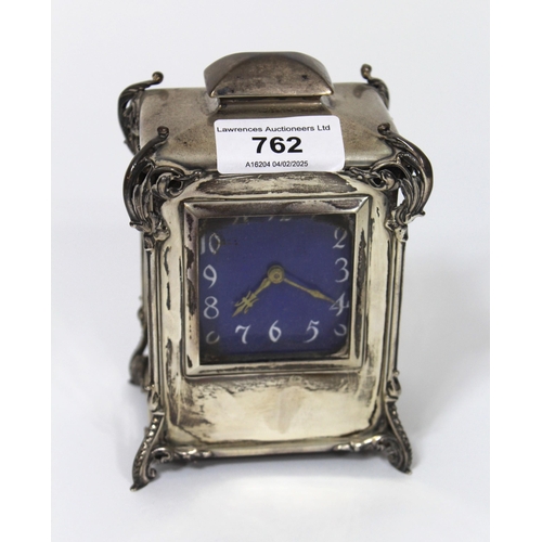 762 - Early 20th Century silver cased dressing table clock with enamel dial and keywind movement, 13cm hig... 