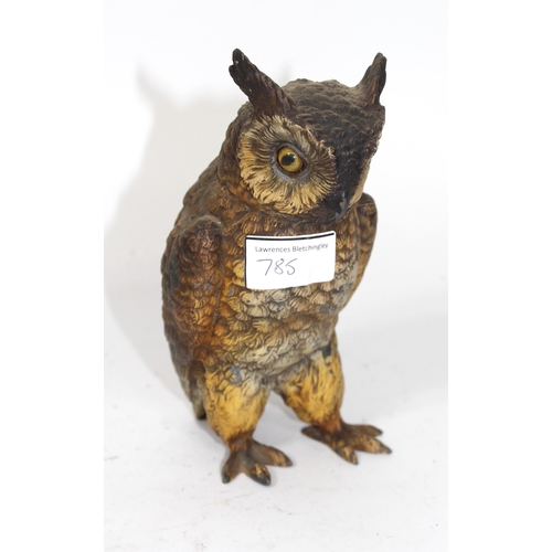 785 - Silvered resin figure of a bird of prey, silver plated figure of an owl and a cold painted spelter f... 