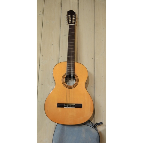 91 - Two classical guitars (one at fault)