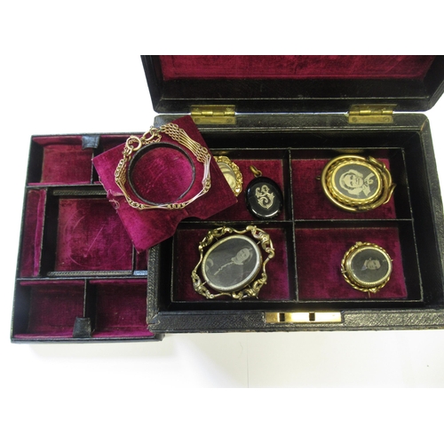 924 - 19th Century leather jewellery box containing a collection of five various mourning brooches / penda... 