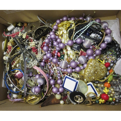 930 - Three boxes of various costume jewellery