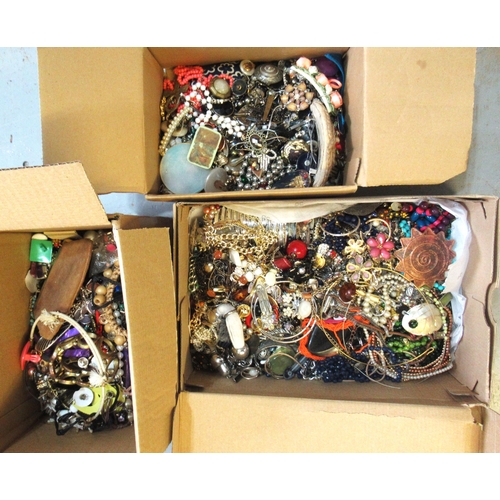 932 - Four boxes of various costume jewellery