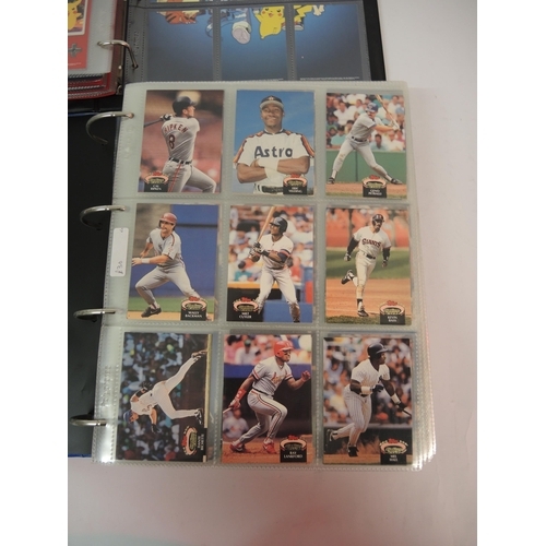 385 - Five albums of Topps trading cards including Pokemon, football and baseball etc.