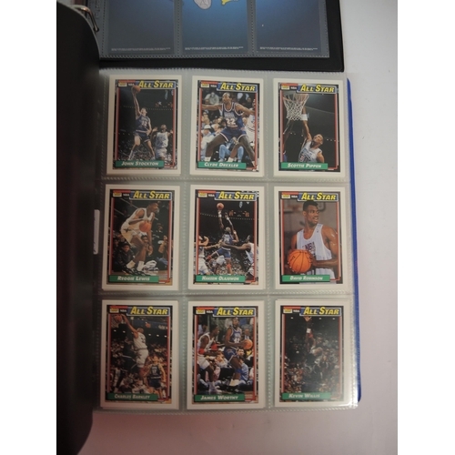 385 - Five albums of Topps trading cards including Pokemon, football and baseball etc.