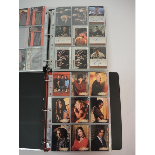 386 - One album of Inkworks Smallville trading cards including various autographs, an album of Battlestar ... 