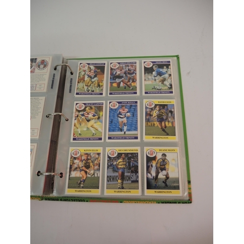 393 - One album of Shooting Football trading cards and Merlin rugby trading cards, together with four mixe... 