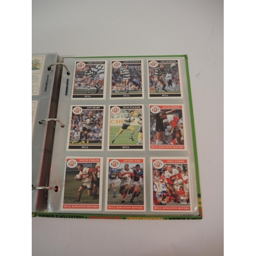 393 - One album of Shooting Football trading cards and Merlin rugby trading cards, together with four mixe... 