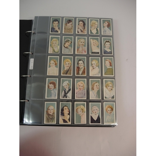 396 - One large album of Godfrey Phillips cigarette cards