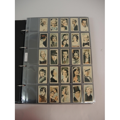 396 - One large album of Godfrey Phillips cigarette cards