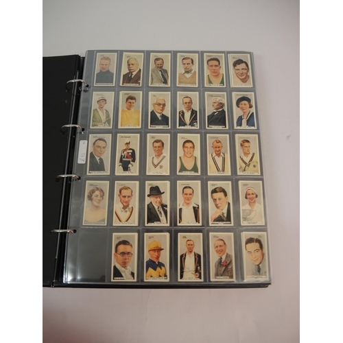 396 - One large album of Godfrey Phillips cigarette cards