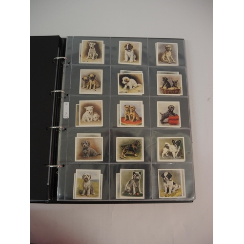 396 - One large album of Godfrey Phillips cigarette cards