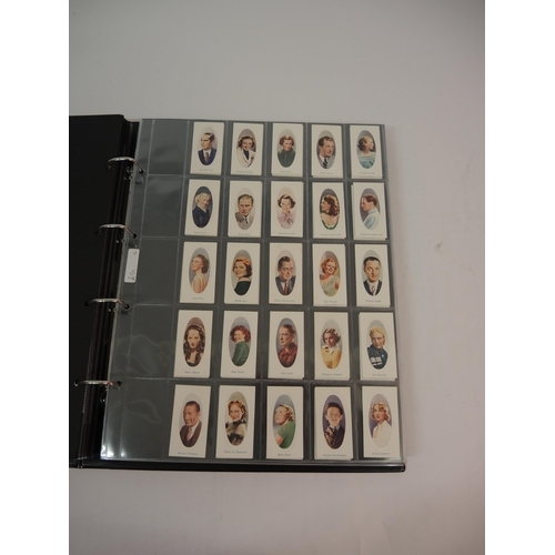 396 - One large album of Godfrey Phillips cigarette cards