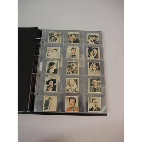 396 - One large album of Godfrey Phillips cigarette cards