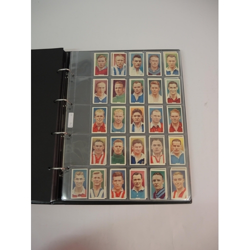 396 - One large album of Godfrey Phillips cigarette cards