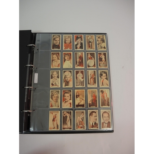 396 - One large album of Godfrey Phillips cigarette cards