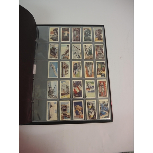 396 - One large album of Godfrey Phillips cigarette cards