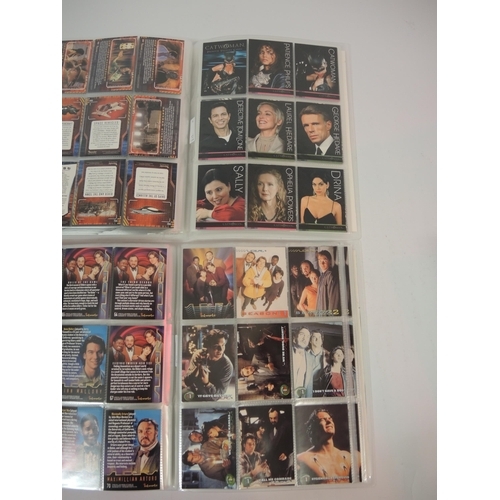 398 - Ten albums of Inkworks trading cards, including Hellboy, Small Soldiers, Men In Black, etc.